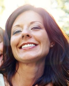 woman showing her perfect veneers