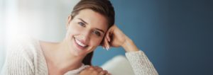 Woman smiling after getting veneers