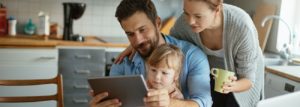 Family looking at tablet