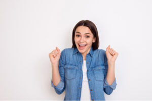 woman excited about her Summer smile makeover